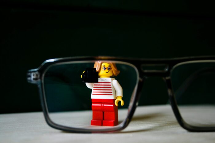 lego girl inside glasses frames